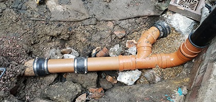 installing new drainage pipes